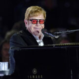 FILE - Elton John performs on the South Lawn of the White House in Washington on Sept. 23, 2022. John has achieved EGOT status. The famed British singer-pianist secured an Emmy Award on Monday night, Jan. 15, 2024, for best variety special (live) for “Elton John Live: Farewell from Dodger Stadium,” a three-hour concert documentary that streamed on Disney +.  (AP Photo/Susan Walsh, File)