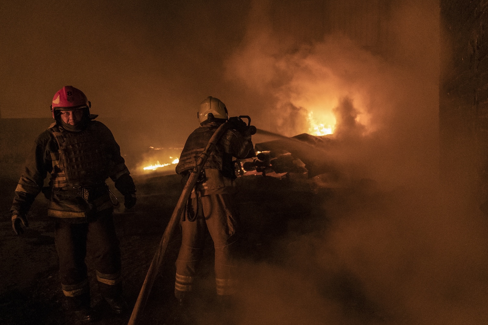 epa11141324 Rescue services work at the scene of a drone strike in the Eastern Ukrainian city of Kharkiv, Ukraine, 10 February 2024. Russian drone strikes hit Kharkiv night of 09 February killing at least seven people, including five children, and three injured, State Emergency Service said.  EPA/YAKIV LIASHENKO