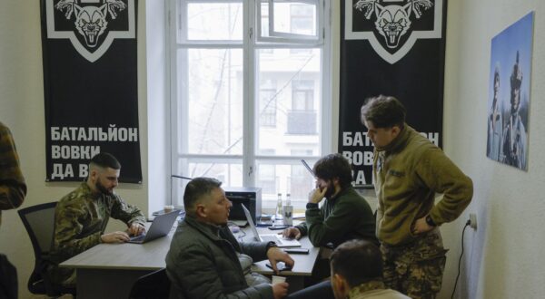 epa11142328 Recruiting center members attend the opening of the 'Da Vinci Wolves' battalion recruiting center in Kyiv (Kiev), Ukraine, 10 February 2024, amid the Russian invasion. The Separate Mechanized Battalion 'Da Vinci Wolves' named after 'Dmytro Kotsiubailo' announced the opening of recruiting centers in several cities across the country. The volunteer battalion was created in 2014 by its first commander Dmytro Kotsiubailo, who died in combat near the frontline city of Bakhmut in March 2023. Russian troops entered Ukrainian territory on 24 February 2022, starting a conflict that has provoked destruction and a humanitarian crisis.  EPA/SERGEY DOLZHENKO