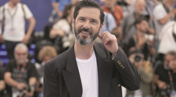 Melvil Poupaud poses for photographers at the photo call for the film 'Just the Two of Us' at the 76th international film festival, Cannes, southern France, Wednesday, May 24, 2023. (Photo by Scott Garfitt/Invision/AP)