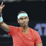 FILE - Rafael Nadal of Spain waves to the crowd in his match against Dominic Thiem of Austria during the Brisbane International tennis tournament in Brisbane, Australia, Tuesday, Jan. 2, 2024. Rafael Nadal pulled out of the BNP Paribas Open on Wednesday night, March 6, 2024, a day before he was supposed to play his first official match in two months. Nadal, a 22-time Grand Slam champion, posted the news on social media, writing that he was announcing the withdrawal “with great sadness.” (AP Photo/Tertius Pickard, File)