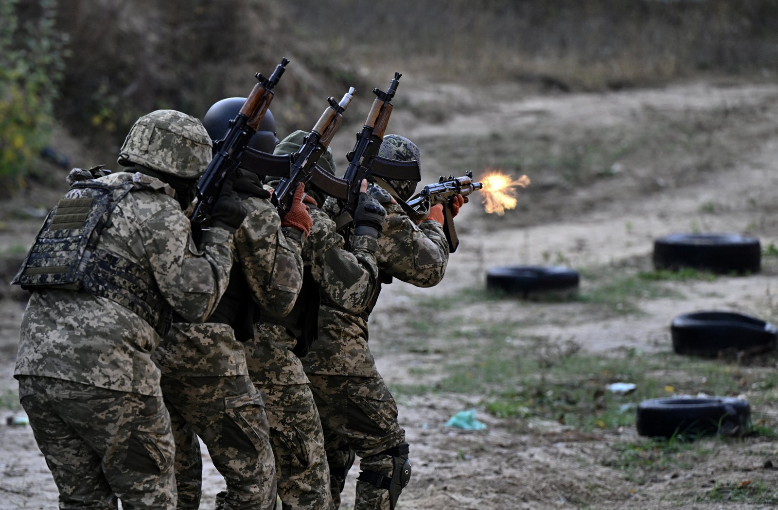 Members of a newly-formed "Siberian Battalion" within the Ukrainian Armed Forces take part in a military training exercise outside Kyiv on October 24, 2023, amid the Russian invasion of Ukraine. A newly formed "Siberian Battalion" as part of the International Legion within the Ukrainian Armed Forces is made up of Russians who have come to fight against their fellow citizens. They were a varied group-both ethnic Russians with long-standing opposition views and members of minority ethnic groups.,Image: 816388612, License: Rights-managed, Restrictions: , Model Release: no, Credit line: Genya SAVILOV / AFP / Profimedia