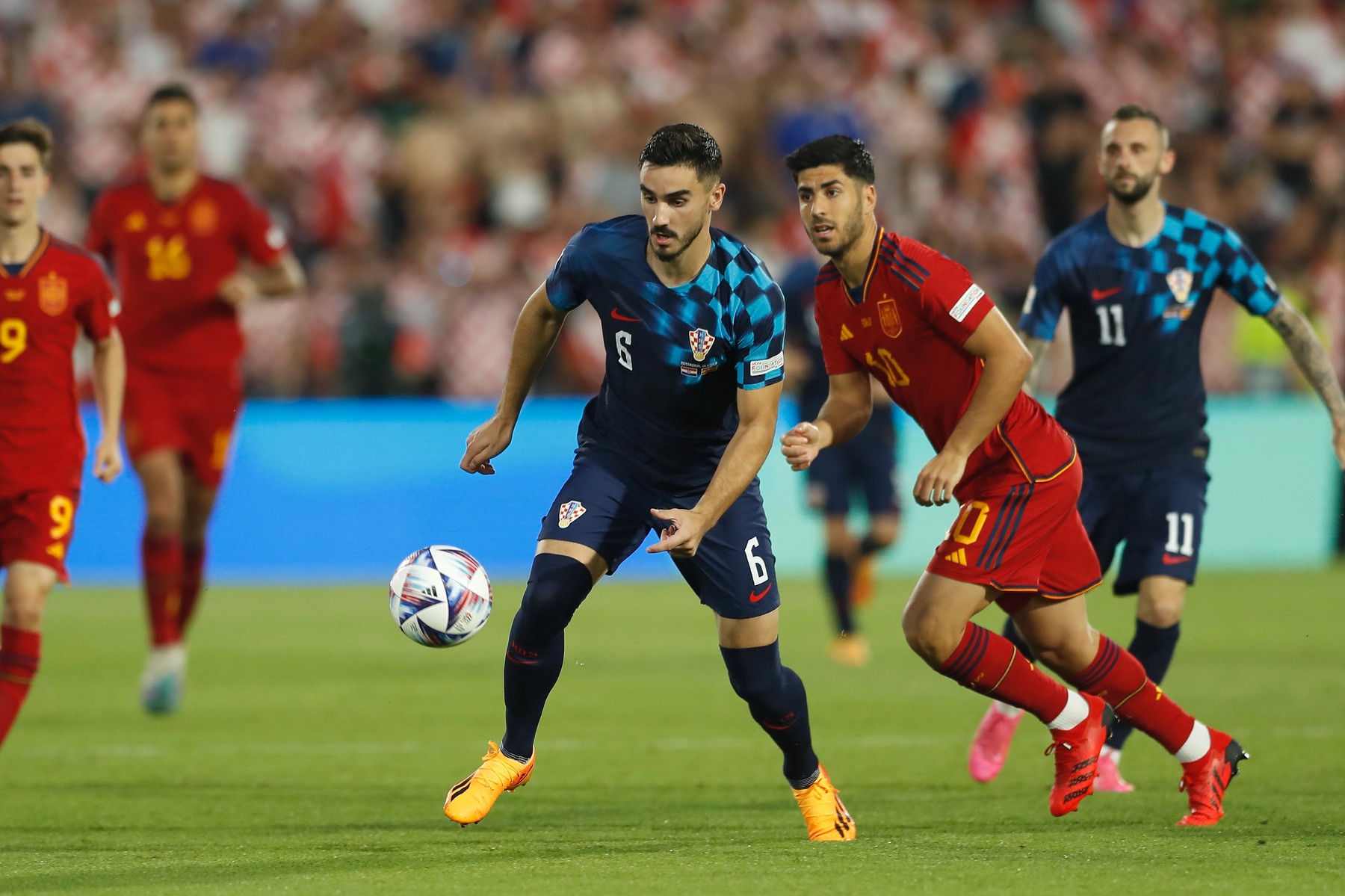 (L-R) Josip Sutalo (CRO), Marco Asensio (ESP), JUNE 18, 2023 - Football / Soccer : UEFA Nations League final match between Croatia 0 (PK 4-5) 0 Spain at the Stadion Feijenoord 'De Kuip' in Rotterdam, Netherlands. (Photo by Mutsu Kawamori/AFLO),Image: 784400358, License: Rights-managed, Restrictions: No third party sales, Model Release: no, Credit line: Mutsu Kawamori / AFLO / Profimedia