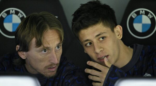 MADRID, SPAIN - FEBRUARY 04: Arda Guler (R) and Luka Modric (L) of Real Madrid follow the La Liga week 23 football match between Real Madrid and Atletico Madrid at Santiago Bernabeu Stadium in Madrid, Spain on February 04, 2024. Burak Akbulut / Anadolu,Image: 843475277, License: Rights-managed, Restrictions: , Model Release: no, Credit line: AA/ABACA / Abaca Press / Profimedia