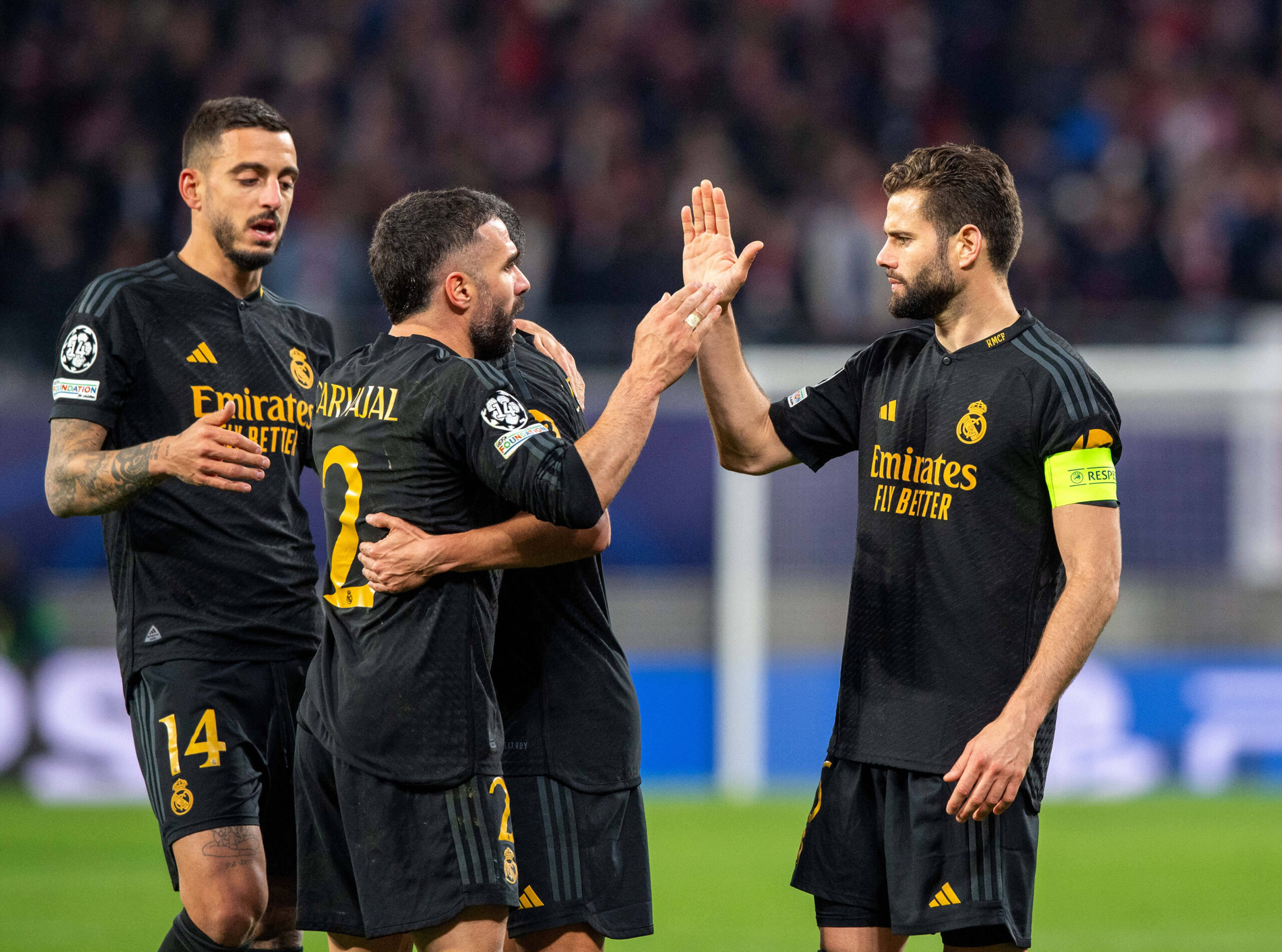 Fussball, Herren, Saison 2023/2024, UEFA Champions League Achtelfinale, Hinspiel, RB Leipzig - Real Madrid, v. l. Joselu, Dani Carvajal, Nacho alle Madrid, Jubel nach dem Abpfiff, 13.02. 2024, *** Football, Men, 2023 2024 season, UEFA Champions League round of 16, first leg , RB Leipzig Real Madrid, f l Joselu, Dani Carvajal, Nacho all Madrid , cheering after the final whistle, 13 02 2024, Copyright: xSebastianxRäppold/MatthiasxKochx