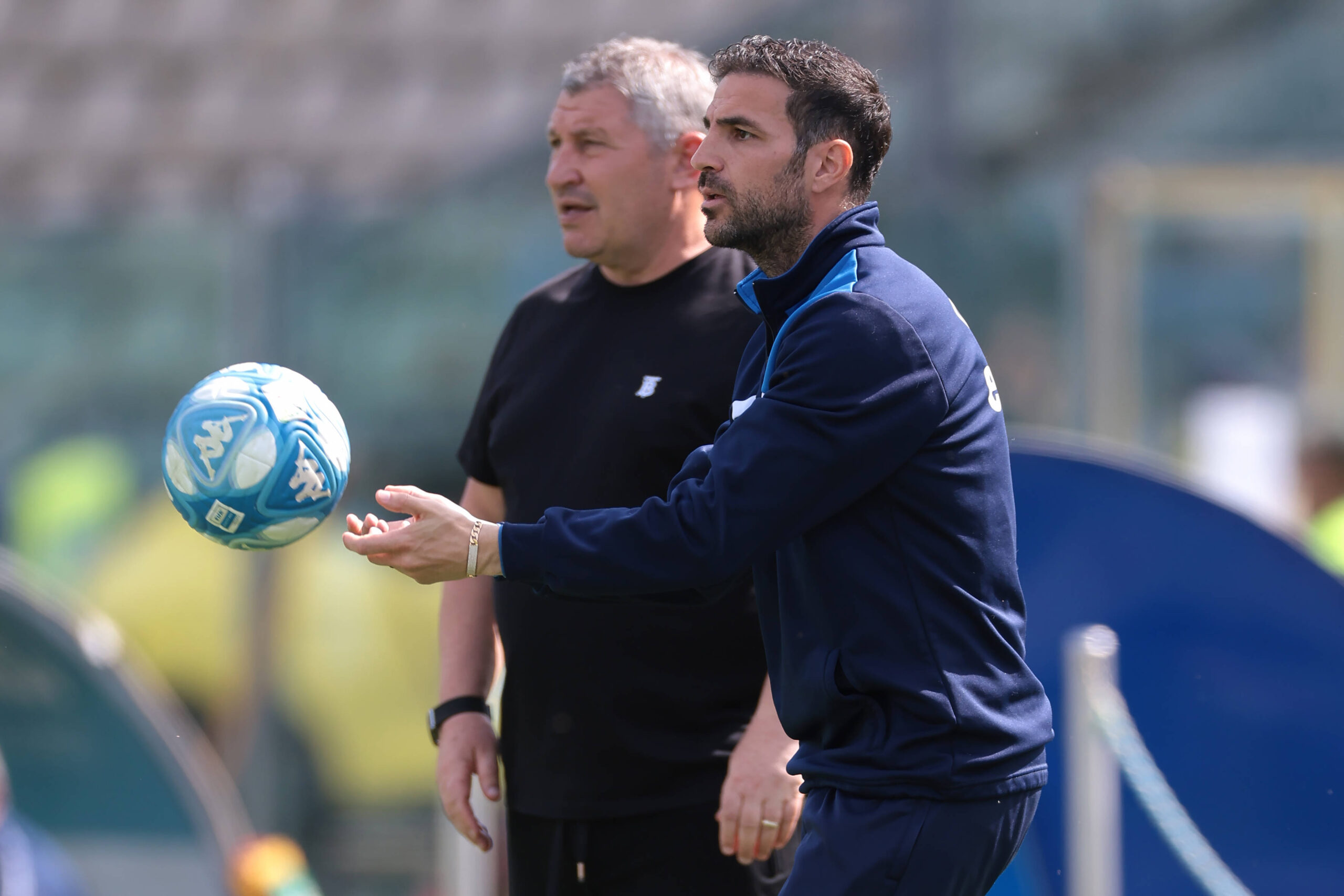 Modena, Italy, 5th May 2024. Osian Roberts Head coach of Como looks on as Cesc Fabregas Assistant Coach of Como 1907 throws the ball abck into play during the Serie B match at Stadio Alberto Braglia, Modena. Picture credit should read: Jonathan Moscrop / Sportimage EDITORIAL USE ONLY. No use with unauthorised audio, video, data, fixture lists, club/league logos or live services. Online in-match use limited to 120 images, no video emulation. No use in betting, games or single club/league/player publications. SPI-3126-0035