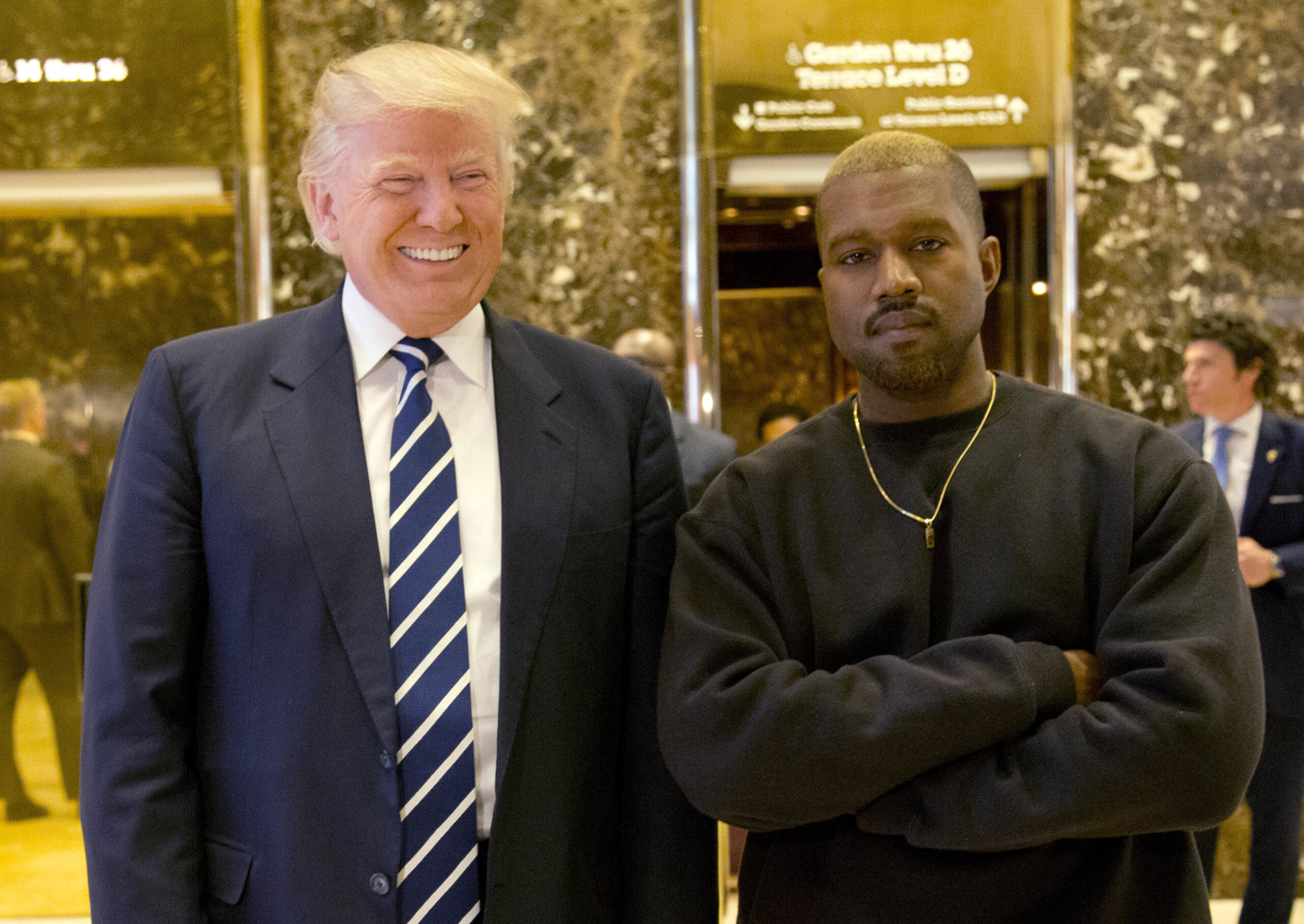 FILE - In this Dec. 13, 2016, file photo, President-elect Donald Trump and Kanye West pose for a picture in the lobby of Trump Tower in New York. West has deleted tweets posted on Dec. 13, 2016, explaining the meeting. (AP Photo/Seth Wenig, File)