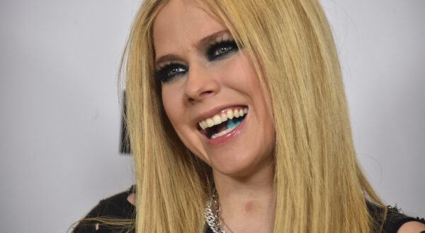 Avril Lavigne poses in the press room at the iHeartRadio Music Awards on Monday, April 1, 2024, in Los Angeles. (Photo by Jordan Strauss/Invision/AP)