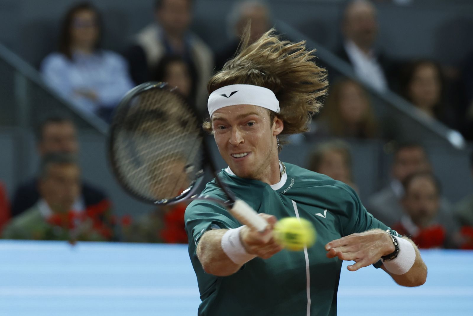 epa11320167 Andrey Rublev of Russia in action during his men's single final match against Felix Auger-Aliassime of Canada at the Madrid Open tennis tournament in Madrid, Spain, 05 May 2024.  EPA/Chema Moya