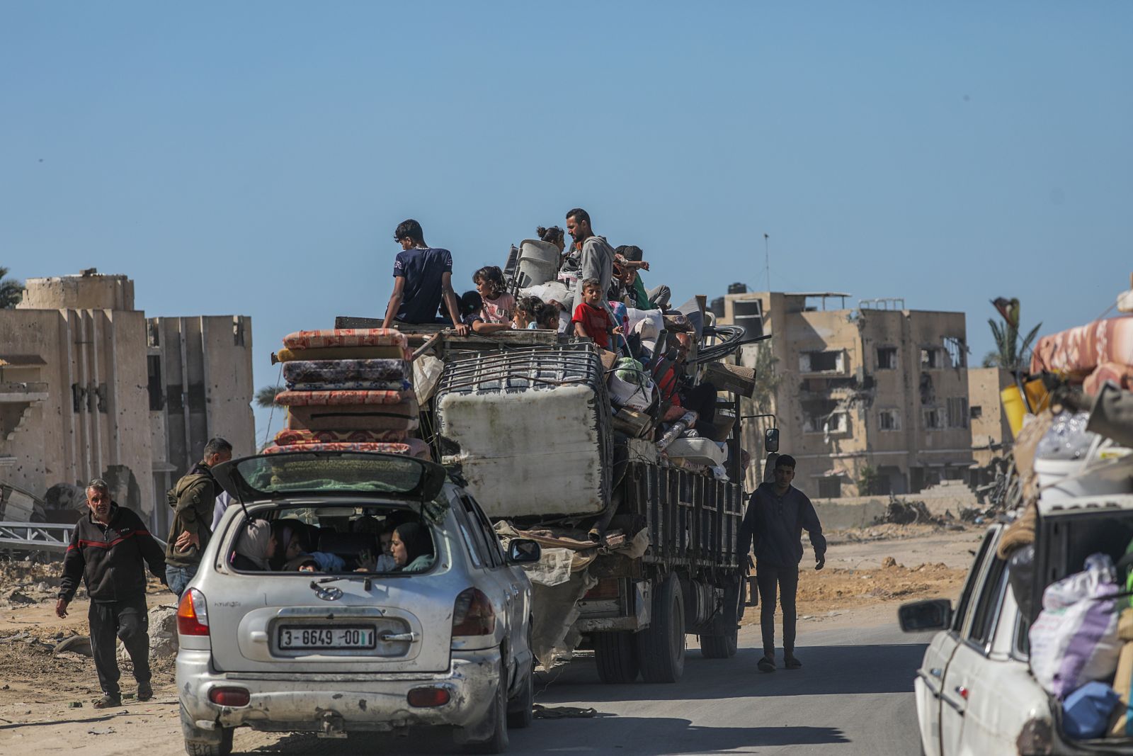 epa11327456 Internally displaced Palestinians leave with their belongings following an evacuation order issued by the Israeli army, in Rafah, southern Gaza Strip, 08 May 2024. The Israel Defence Forces (IDF) on 06 May called on residents of eastern Rafah to 'temporarily' evacuate to an expanded humanitarian area. On 07 May the IDF stated that its ground troops began an overnight operation targeting Hamas militants and infrastructure within specific areas of eastern Rafah, taking operational control of the Gazan side of the Rafah crossing based on intelligence information. More than 34,600 Palestinians and over 1,455 Israelis have been killed, according to the Palestinian Health Ministry and the IDF, since Hamas militants launched an attack against Israel from the Gaza Strip on 07 October 2023, and the Israeli operations in Gaza and the West Bank which followed it.  EPA/MOHAMMED SABER