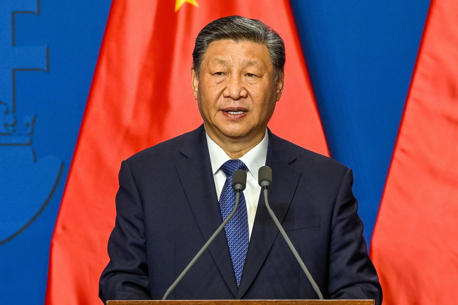 epa11329762 Chinese President Xi Jinping speaks during his joint press confrence with Hungarian Prime Minister (not pictured) following their talks at the PM's office, the former Carmelite Monastery, in Budapest, Hungary, 09 May 2024.  EPA/Szilard Koszticsak HUNGARY OUT