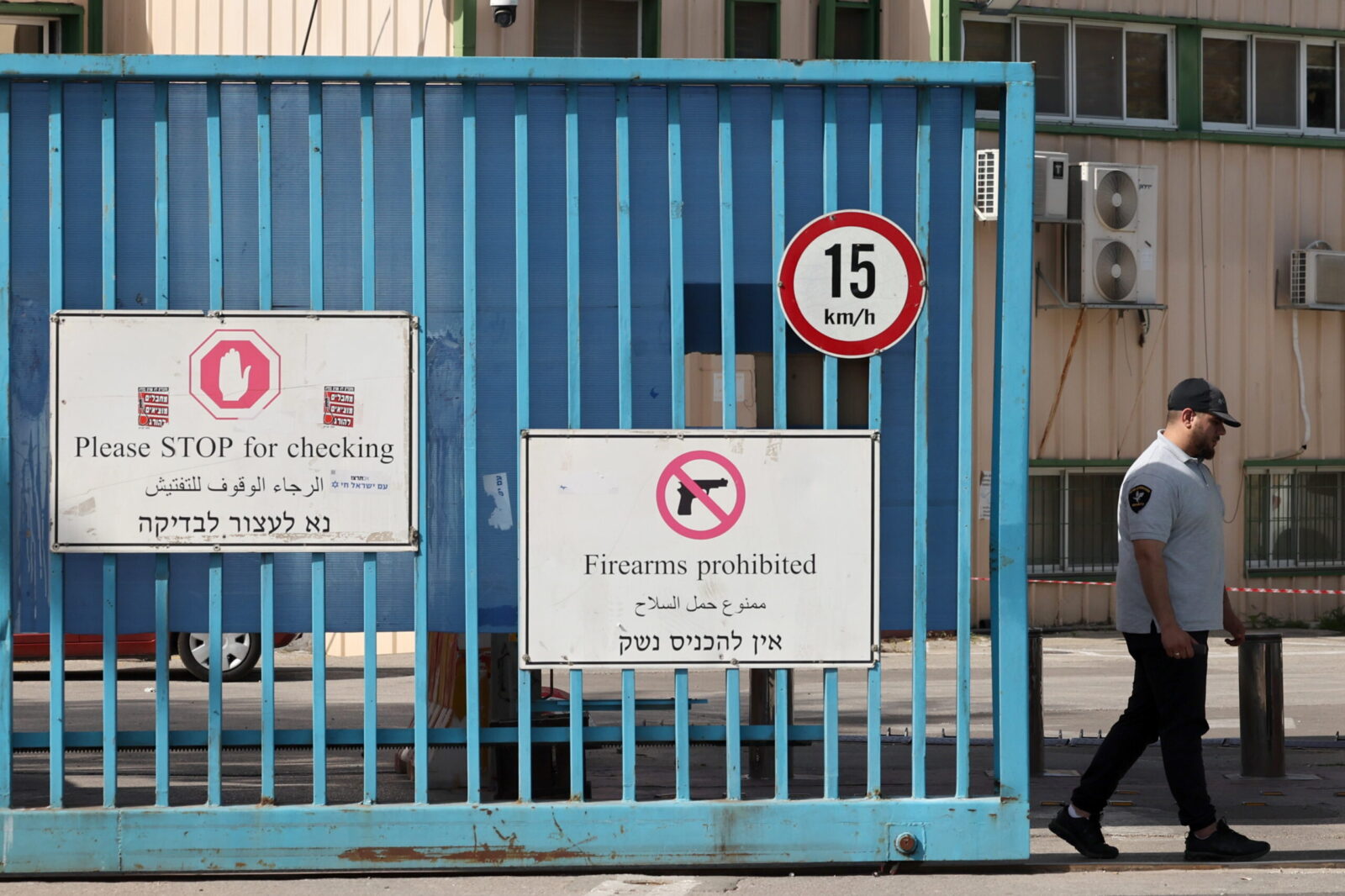 epa11330733 Security at the entrance to the United Nations Relief and Works Agency for Palestine Refugees in the Near East (UNRWA) offices in Jerusalem, 10 May 2024. UNRWA Secretary General Philip Lazzarini stated on 09 May evening that 'Israeli residents' set fire twice to the perimeter of the UNRWA headquarters in East Jerusalem. The fire caused 'extensive damage' to the outdoor areas as UNRWA and other UN agencies' staff were on the compound, he said. There were no casualties among the staff but 'the lives of UN staff were at a serious risk', Lazzarini added. Following weeks of repeated attacks, Lazzarini, who called for an end to 'these attacks' and holding all those responsible accountable, announced that he had taken the decision to close down the compound until 'proper security is restored'.  EPA/ABIR SULTAN