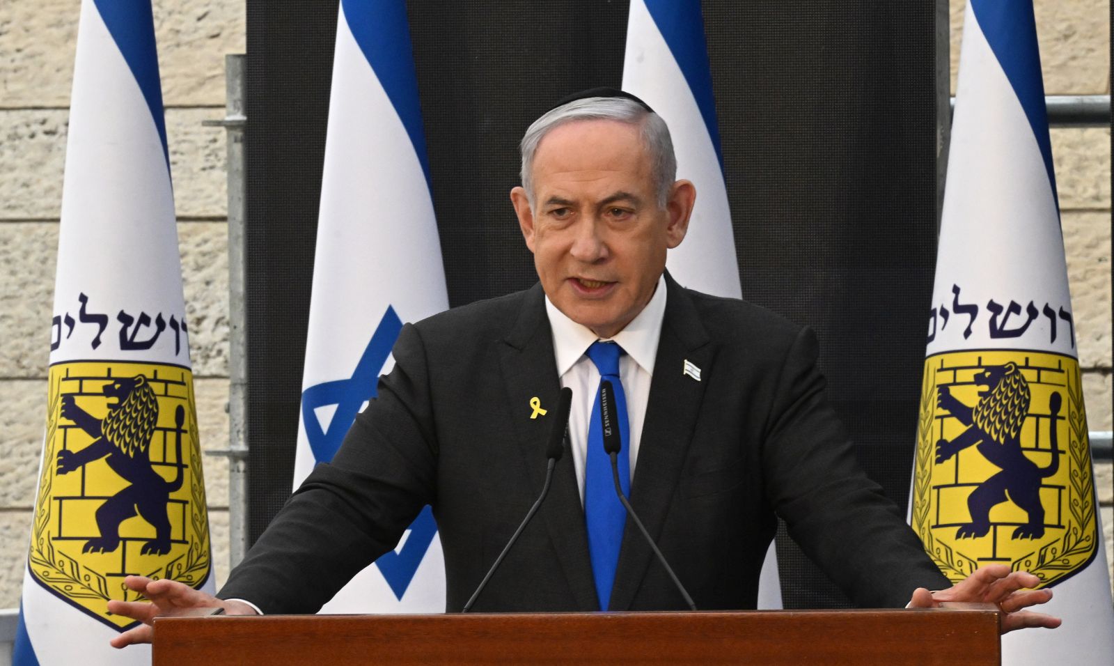 epa11335349 Israeli Prime Minister Benjamin Netanyahu speaks at a ceremony for Remembrance Day for the fallen of Israel's wars and victims of terrorism, at Yad LeBanim in Jerusalem, 12 May 2024. Israel marks Memorial Day (Yom HaZikaron) in remembrance of its fallen soldiers and victims of terrorism.  EPA/DEBBIE HILL / POOL