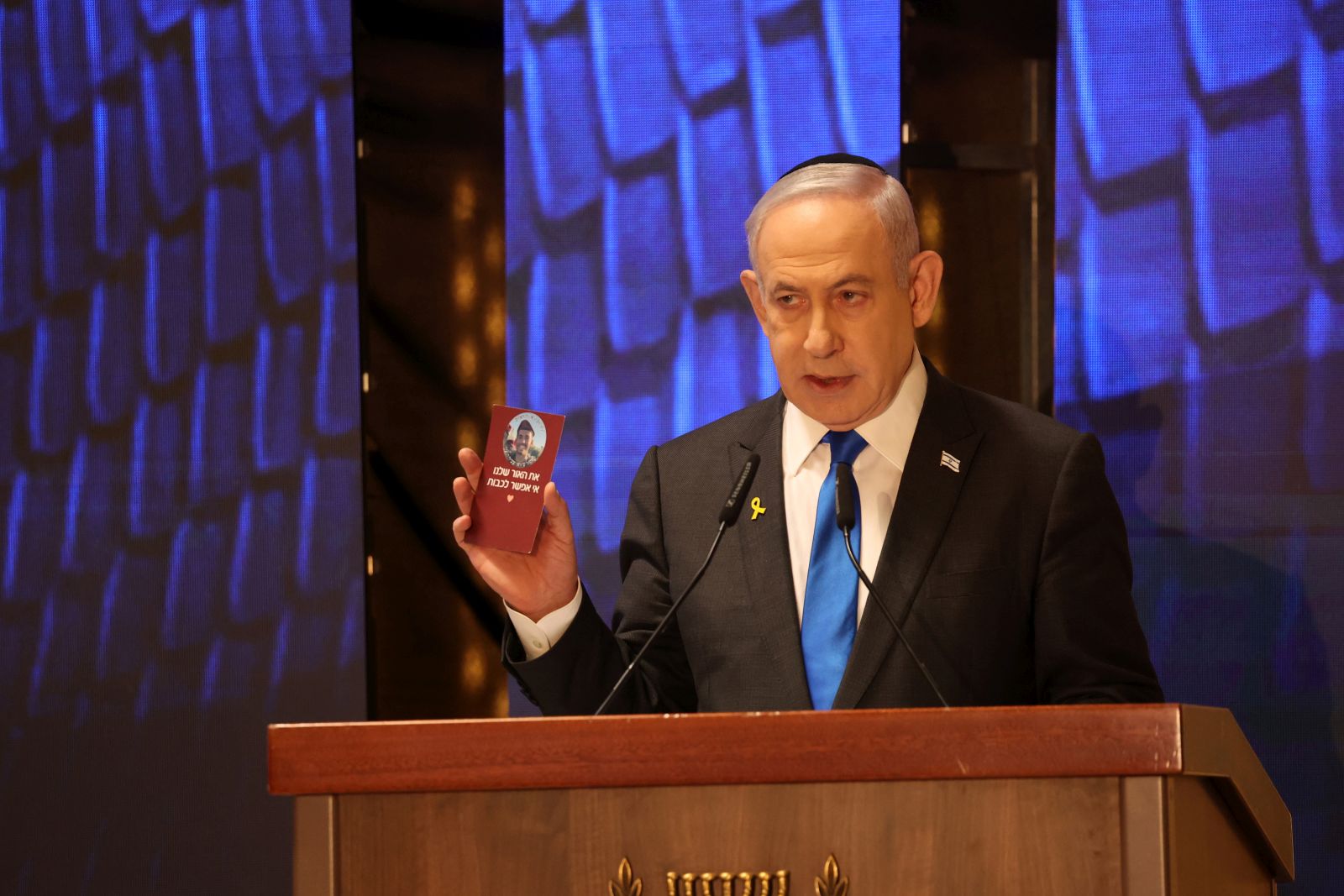 epa11336577 Israeli Prime Minister Benjamin Netanyahu addresses a ceremony marking Memorial Day for fallen soldiers of Israel’s wars and victims of attacks at Israel's Mount Herzl national military cemetery in Jerusalem, 13 May 2024. Israel marks Memorial Day (Yom HaZikaron) to commemorate fallen soldiers and victims of attacks recorded since 1860 by the defence ministry.  EPA/GIL COHEN-MAGEN / POOL