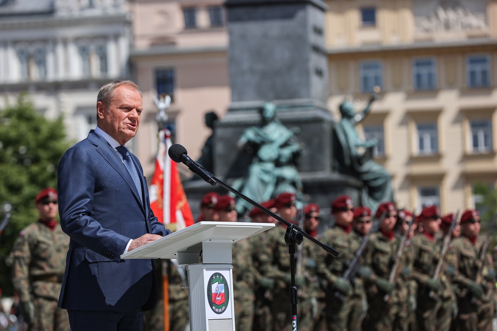 epa11349933 Polish Prime Minister Donald Tusk speaks during a ceremony to mark the 80th anniversary of the 'Battle of Monte Cassino' at the Main Market Square, Krakow, southern Poland, 18 May 2024. The Battle of Monte Cassino, also called the 'Battle of Rome', was a series of four military assaults from February to 18 May 1944 by the Allied Forces against Nazi-German forces in Italy during the Italian Campaign of World War II, in which soldiers from the Polish II Corps launched one of the final assaults on 16 May 1944.  EPA/ART SERVICE POLAND OUT