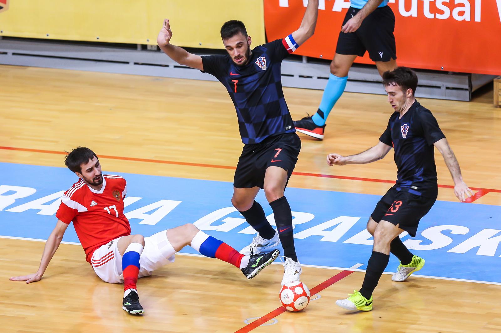 01.02.2020., SD Gradski vrt, Osijek - Elitno kolo kvalifikacija za Svjetsko prvenstvo u futsalu, Rusija - Hrvatska. Artem Niyazov, Franko Jelovcic, Kristijan Postruzin Photo: Davor Javorovic/PIXSELL