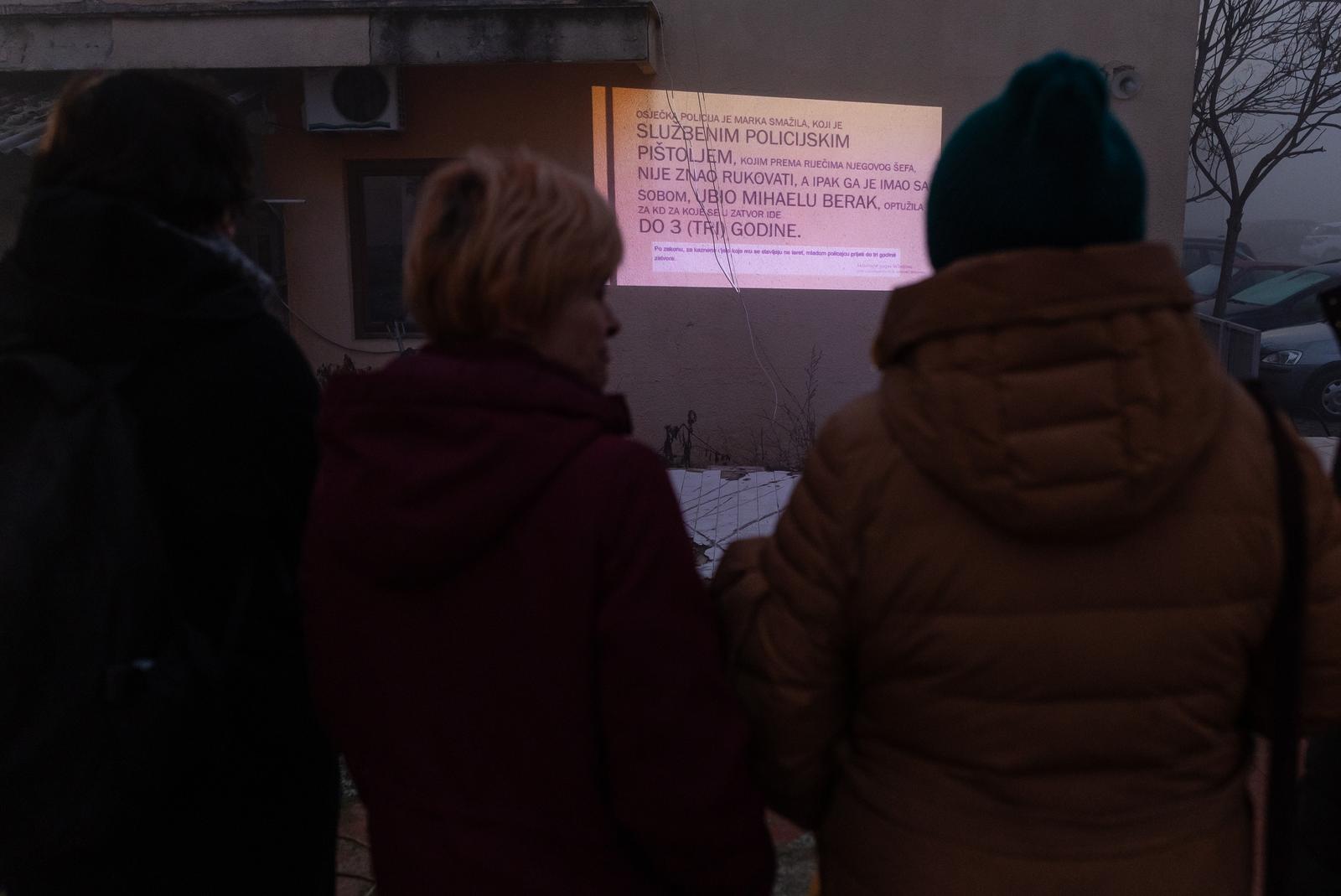 20.12.2023., Osijek - Tocno tri mjeseca nakon ubojstva Mihaele Berak u Osijeku, Udruga Adela je ispred zgrade Prve policijske postaje odrzala projekciju videa "Sigurnost i povjerenje".  Photo: Davor Javorovic/PIXSELL