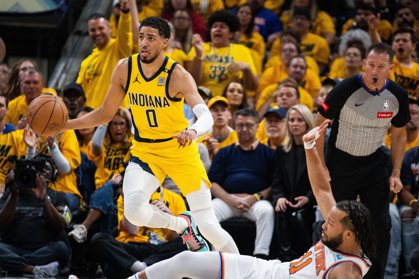 May 10, 2024; Indianapolis, Indiana, USA; Indiana Pacers guard Tyrese Haliburton (0) dribbles the ball while New York Knicks guard Jalen Brunson (11) defends during game three of the second round for the 2024 NBA playoffs at Gainbridge Fieldhouse. Mandatory Credit: Trevor Ruszkowski-USA TODAY Sports Photo: Trevor Ruszkowski/REUTERS