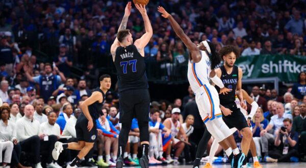 May 18, 2024; Dallas, Texas, USA;  Dallas Mavericks guard Luka Doncic (77) shoots over Oklahoma City Thunder guard Luguentz Dort (5) during the second quarter in game six of the second round of the 2024 NBA playoffs at American Airlines Center. Mandatory Credit: Kevin Jairaj-USA TODAY Sports Photo: Kevin Jairaj/REUTERS