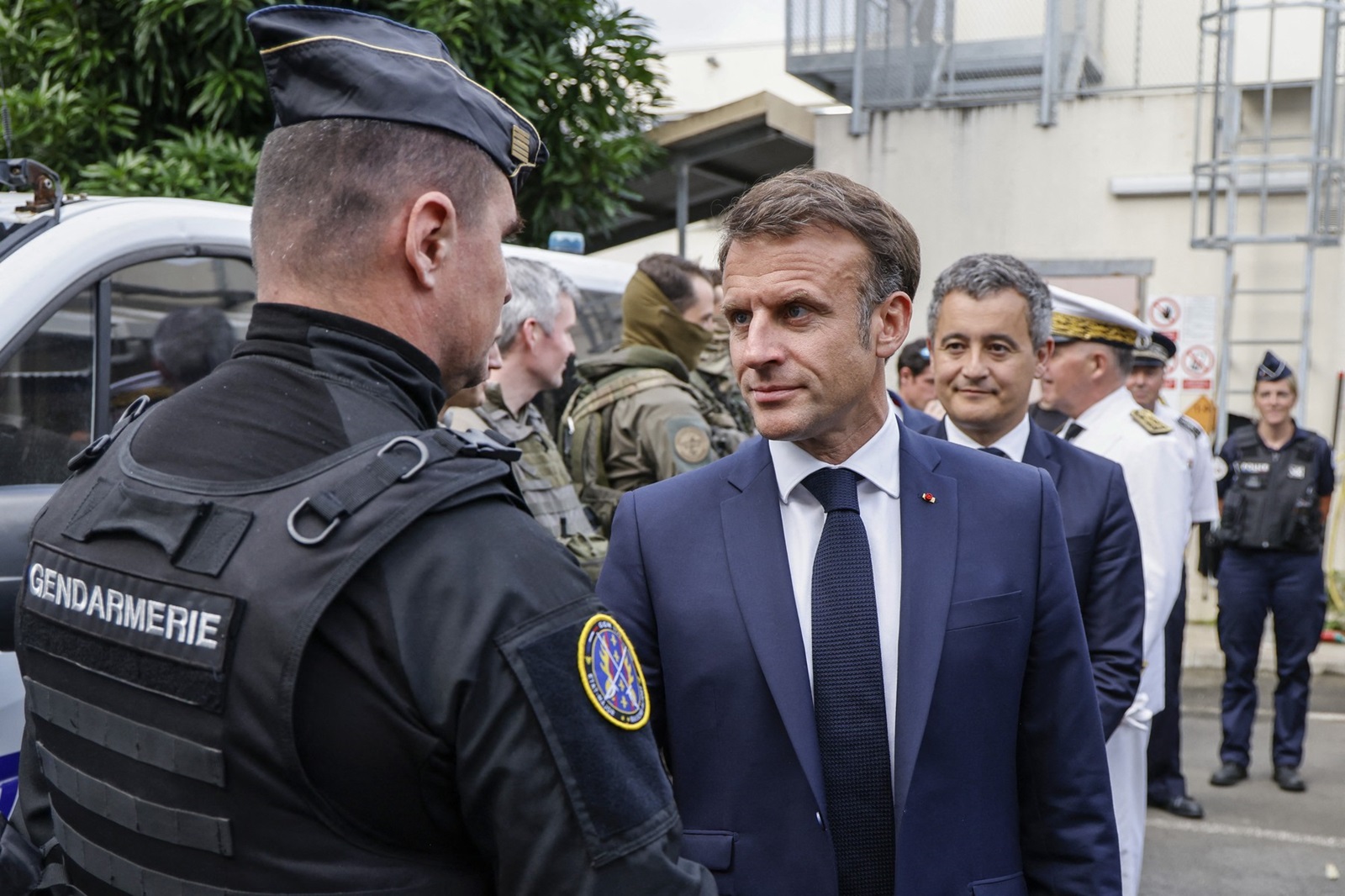 French President Emmanuel Macron visits the central police station with France's Minister for Interior and Overseas Gerald Darmanin (R) in Noumea, France's Pacific territory of New Caledonia on May 23, 2024. France's president made a long-haul trip to the restive Pacific territory of New Caledonia on on May 23, urging a "return to peace" after deadly rioting, and vowing thousands of military reinforcements will be deployed for "as long as necessary".,Image: 875675314, License: Rights-managed, Restrictions: , Model Release: no, Credit line: Ludovic MARIN / AFP / Profimedia