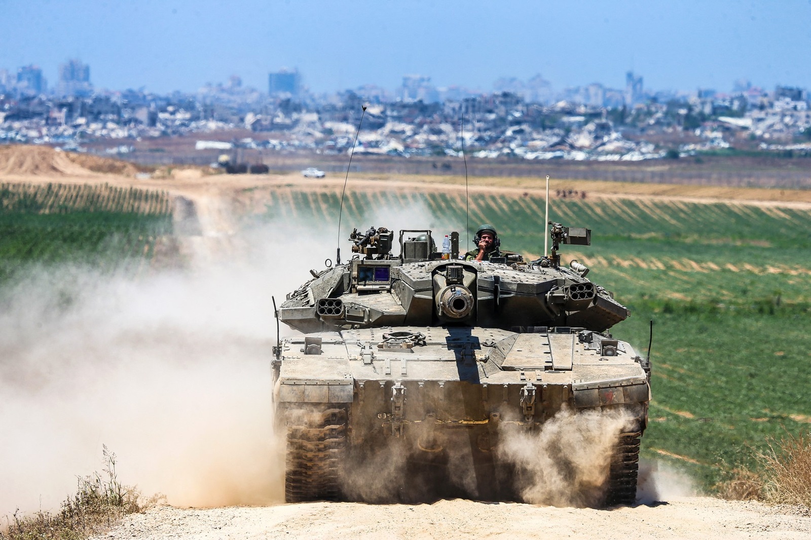 An Israeli army battle tank moves near the border with the Gaza Strip in southern Israel on May 16, 2024, amid the ongoing conflict between Israel and the militant group Hamas. Five Israeli paratroopers were killed and several injured when an Israeli tank fired on them in the latest friendly-fire incident during the country’s war against Hamas militants in the Gaza Strip. The Israel Defense Forces said on Thursday that a tank fired twice at the troops, with an initial review showing that it was likely the result of misidentification during fierce fighting with “Hamas in a dense urban area” in Jabalia. IDF troops have returned to the ruins of the northern Gaza refugee camp a few months after Israel had declared the area cleared of Hamas fighters.,Image: 873766002, License: Rights-managed, Restrictions: , Model Release: no, Credit line: Middle East Images/ABACA / Abaca Press / Profimedia