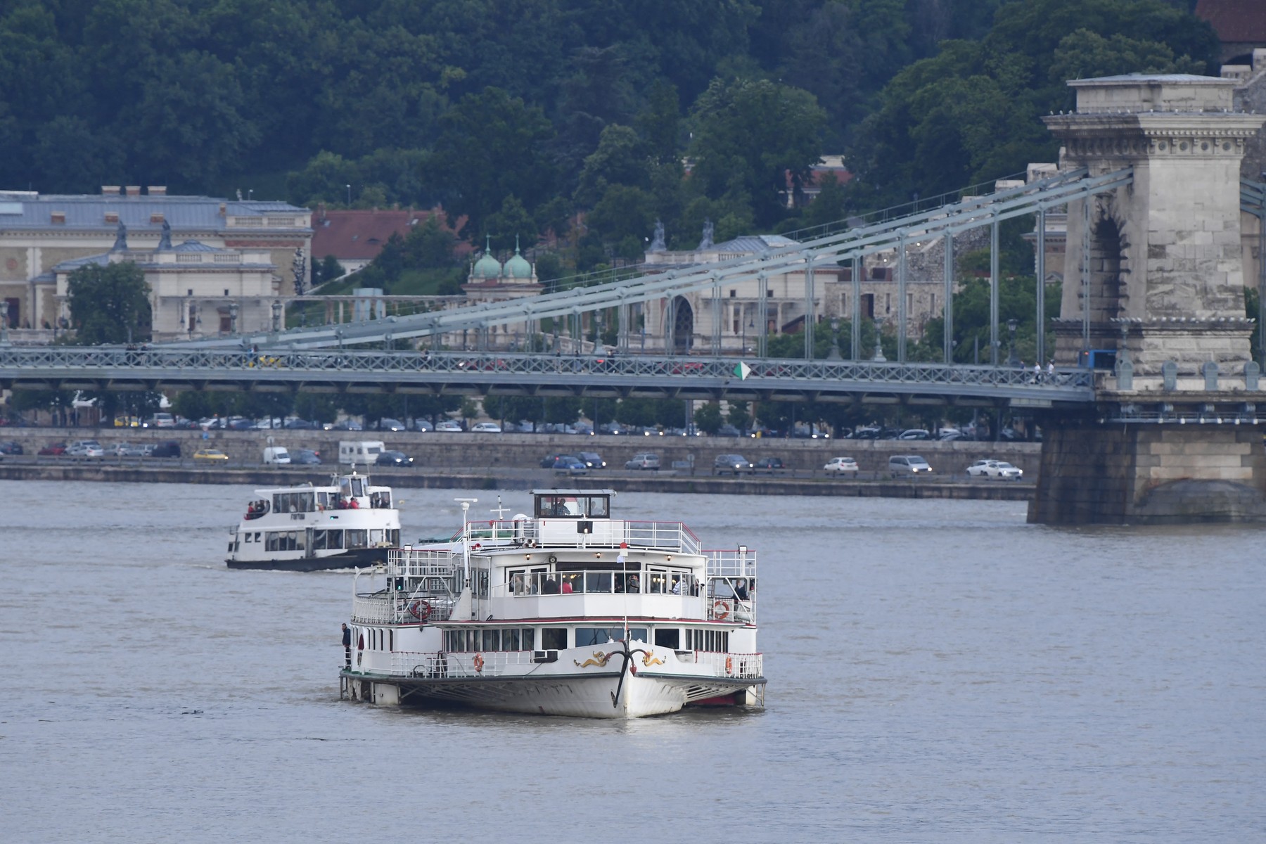 Sightseeing cruises are seen on the Danube river on May 30, 2019 in Budapest during the operations to pull out of the water the "Mermaid" sightseeing boat that sank overnight after colliding with a larger vessel in pouring rain. Hungarian police launched a criminal investigation into one of the country's worst boat accidents that left at least seven South Korean tourists dead and 21 others missing.,Image: 440019027, License: Rights-managed, Restrictions: , Model Release: no, Credit line: Attila KISBENEDEK / AFP / Profimedia
