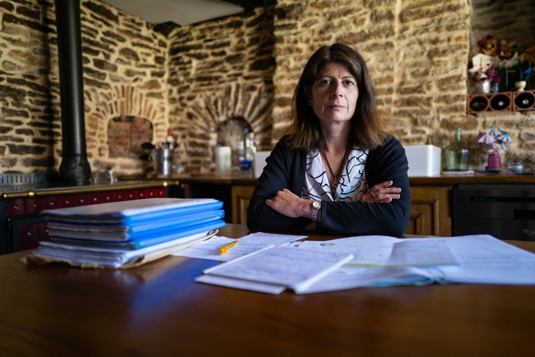 Sophie Rollet poses with her files on her research regarding the tire explosion that caused the death of her husband in 2014, at her home in Geney, eastern France, on July 9, 2020.,Image: 541983631, License: Rights-managed, Restrictions: , Model Release: no, Credit line: SEBASTIEN BOZON / AFP / Profimedia