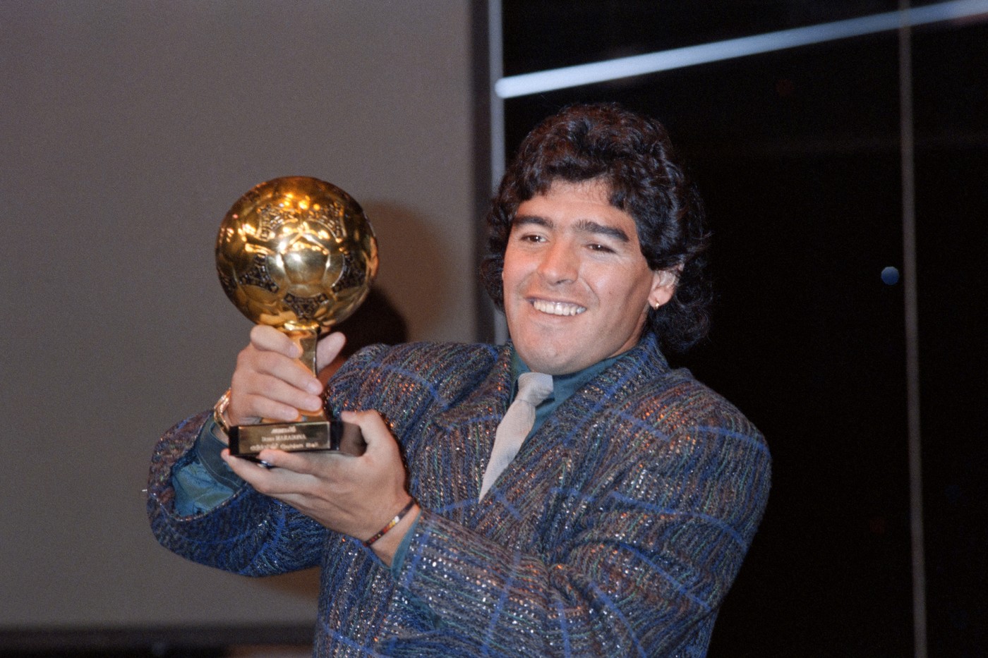 Diego Maradona poses with the Ballon d'Or at the Lido in Paris on November 13, 1986. He was awarded following the 1986 FIFA World Cup. The Golden Ball award is presented to the best player at each FIFA World Cup finals.,Image: 800969633, License: Rights-managed, Restrictions: , Model Release: no, Credit line: Pascal GEORGE / AFP / Profimedia