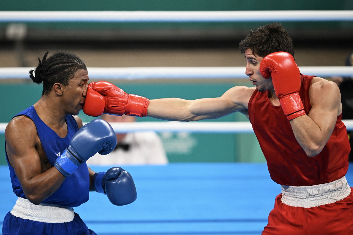 Mexico's Marco Verde (R) and Ecuador's Jose Rodriguez (L) compete in the men's 71kg gold medal final boxing event during the Pan American Games Santiago 2023 at the Olympic Training Centre (CEO) in Santiago on October 27, 2023.,Image: 817295121, License: Rights-managed, Restrictions: , Model Release: no, Credit line: Raul ARBOLEDA / AFP / Profimedia