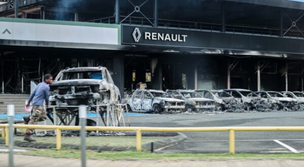 This photograph shows a view of burnt cars and a burnt Renault car shop amid protests linked to a debate on a constitutional bill aimed at enlarging the electorate for upcoming elections in the overseas French territory of New Caledonia, in Noumea, on May 14, 2024. After scenes of violence of "great intensity" including burned vehicles, looted stores and clashes between demonstrators and the police, a curfew was decreed in Noumea, 17,000 kilometers from Paris, as the independentists of the overseas French territory of New Caledonia oppose a constitutional revision they fear will "further minimize the indigenous Kanak people".,Image: 872696346, License: Rights-managed, Restrictions: , Model Release: no, Credit line: Theo ROUBY / AFP / Profimedia