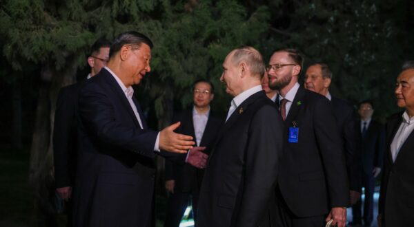 CHINA, BEIJING - MAY 16, 2024: China's President Xi Jinping and Russia's President Vladimir Putin (L-R front) shake hands at an airport before Putin's departure to Kharbin. Mikhail Metzel/POOL/TASS,Image: 873615486, License: Rights-managed, Restrictions: , Model Release: no, Credit line: Mikhail Metzel / TASS / Profimedia