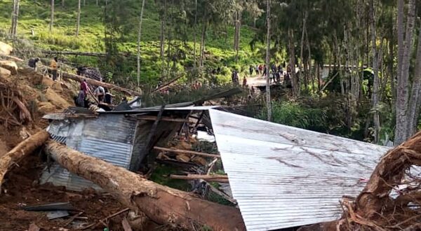 This picture shows a demolished house at the site of a landslide at Yambali Village in the region of Maip Mulitaka, in Papua New Guinea's Enga Province on May 25, 2024. Rescue teams began arriving at the site of a massive landslide in Papua New Guinea's remote highlands on May 25, helping villagers search for the scores of people feared dead under the towering mounds of rubble and mud.,Image: 876245226, License: Rights-managed, Restrictions: , Model Release: no, Credit line: STR / AFP / Profimedia