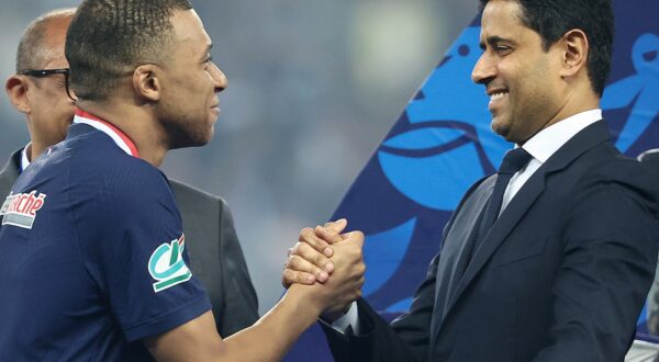 Paris Saint Germain's Qatari President Nasser Al-Khelaifi (R) shakes hands of Paris Saint-Germain's French forward #07 Kylian Mbappe (L) on the podium as he congratulates him on winning the French Cup Final football match between Olympique Lyonnais (OL) and Paris Saint-Germain (PSG) at the Stade Pierre-Mauroy, in Villeneuve-d'Ascq, northern France on May 25, 2024.,Image: 876647472, License: Rights-managed, Restrictions: , Model Release: no, Credit line: FRANCK FIFE / AFP / Profimedia