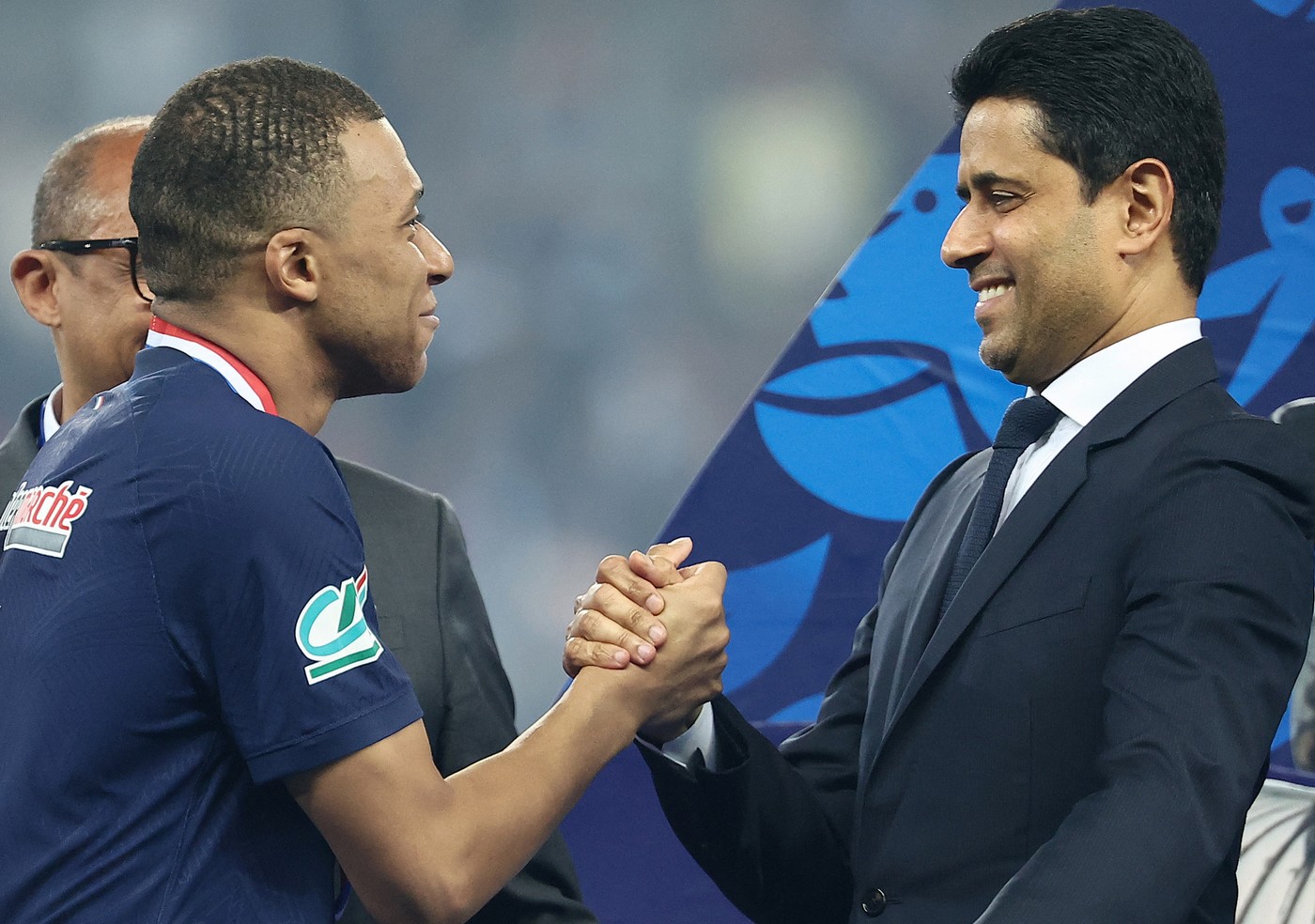 Paris Saint Germain's Qatari President Nasser Al-Khelaifi (R) shakes hands of Paris Saint-Germain's French forward #07 Kylian Mbappe (L) on the podium as he congratulates him on winning the French Cup Final football match between Olympique Lyonnais (OL) and Paris Saint-Germain (PSG) at the Stade Pierre-Mauroy, in Villeneuve-d'Ascq, northern France on May 25, 2024.,Image: 876647472, License: Rights-managed, Restrictions: , Model Release: no, Credit line: FRANCK FIFE / AFP / Profimedia