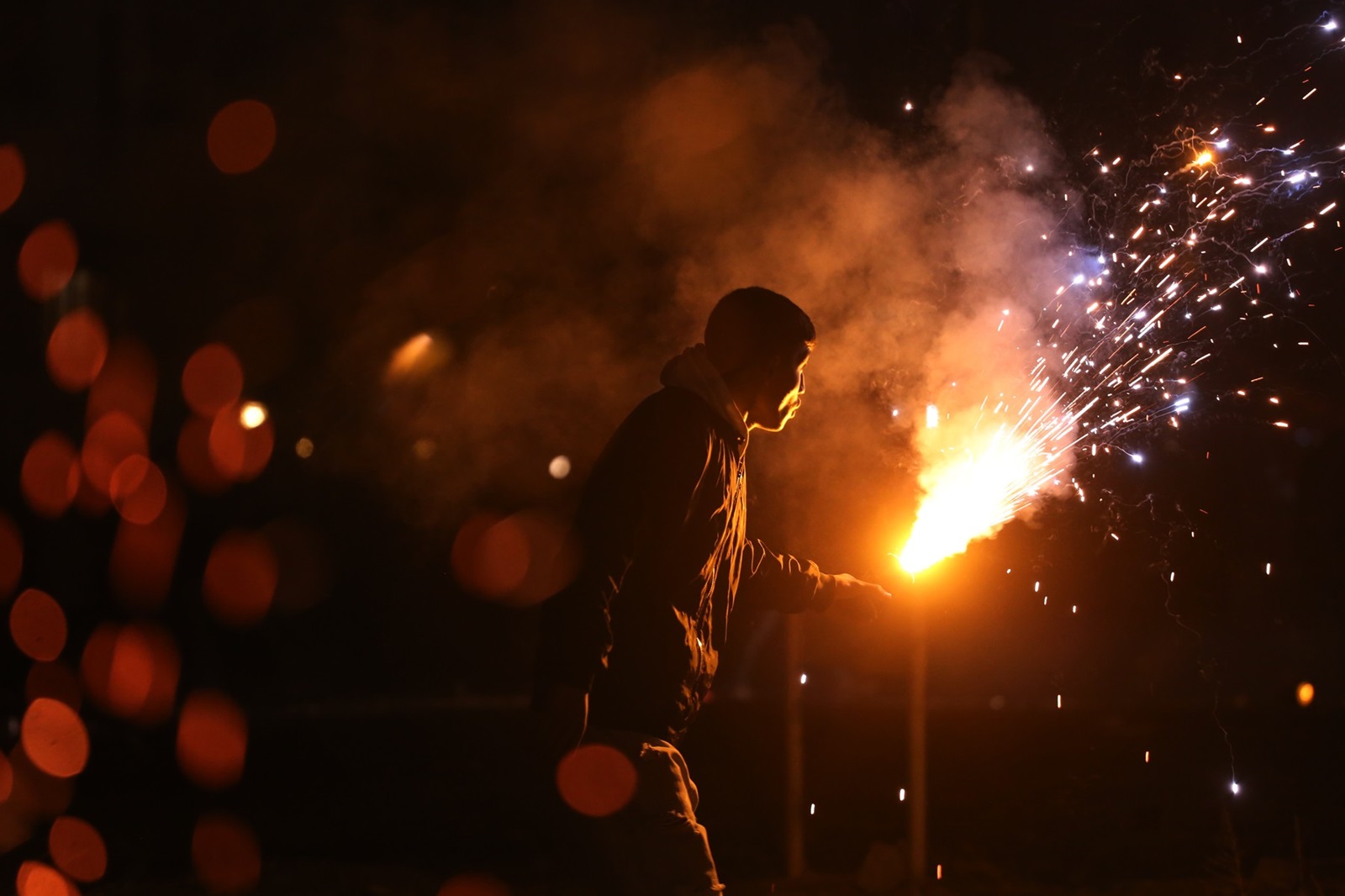 March 12, 2024, Tehran, Iran: An Iranian man takes part on the eve of Wednesday's traditional Fire feast, or Chaharshanbeh Soori, held annually on the last Wednesday eve before the Spring holiday of Nowruz, in Tehran. The Iranian New Year (Nowruz) which begins on March 20 coincides with the first day of spring during which locals revive the Zoroastrian celebration of lighting a fire and dancing around the flame. Nowruz, which has been celebrated for at least three thousand years, is the most revered celebration in the Greater Persian world, which includes the countries of Iran, Afghanistan, Azerbaijan, Turkey, and portions of western China and northern Iraq.,Image: 856343162, License: Rights-managed, Restrictions: , Model Release: no, Credit line: Rouzbeh Fouladi / Zuma Press / Profimedia