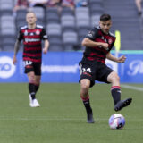 SYDNEY, AUSTRALIA - OCTOBER 22: Nicolas Milanovic of Western Sydney Wanderers passes the ball during the A-League Men's football match between Western Sydney Wanderers FC and Wellington Phoenix at CommBank Stadium on October 22, 2023 in Sydney, Australia. (Photo by Damian Briggs/Speed Media/Icon Sportswire) (Icon Sportswire via AP Images)