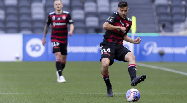 SYDNEY, AUSTRALIA - OCTOBER 22: Nicolas Milanovic of Western Sydney Wanderers passes the ball during the A-League Men's football match between Western Sydney Wanderers FC and Wellington Phoenix at CommBank Stadium on October 22, 2023 in Sydney, Australia. (Photo by Damian Briggs/Speed Media/Icon Sportswire) (Icon Sportswire via AP Images)