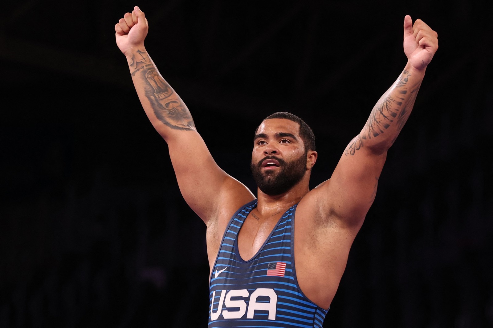 (FILES) USA's Gable Dan Steveson celebrates his gold medal victory against Georgia's Geno Petriashvili in their men's freestyle 125kg wrestling final match during the Tokyo 2020 Olympic Games at the Makuhari Messe in Tokyo on August 6, 2021. Steveson, super-heavyweight freestyle wrestling champion at the 2020 Tokyo Olympics, has signed a free agent contract with the NFL Buffalo Bills, the club announced on May 31, 2024, Steveson's 24th birthday.,Image: 877952230, License: Rights-managed, Restrictions: , Model Release: no, Credit line: Jack GUEZ / AFP / Profimedia