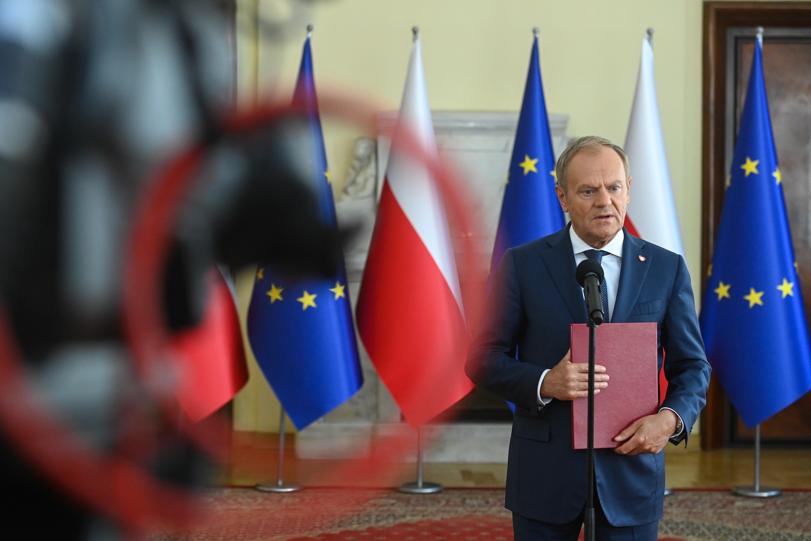 epa11358815 Polish Prime Minister Donald Tusk speaks during a press conference after the government meeting at the headquarters of the Chancellery of the Prime Minister in Warsaw, Poland, 21 May 2024. Donald Tusk issued an order on the establishment of a commission to investigate Russian and Belarusian influence in Poland between 2004-2024.  EPA/Piotr Nowak POLAND OUT