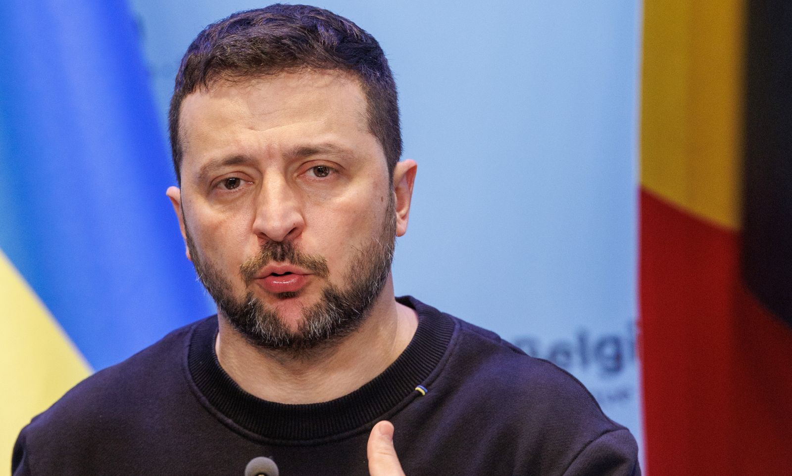 epa11374882 Ukraine's President Volodymyr Zelensky gestures as he addresses the media alongside Belgium's Prime Minister during a surprise visit at the Prime Minister's office in Brussels, Belgium, 28 May 2024. Zelensky visits Belgium to ink the latest in a string of security accords with Western allies. The two leaders will discuss, among other things, Belgium's military support to Ukraine and the signing of a bilateral security agreement, including the supply of F-16 fighter jets as part of the security agreement.  EPA/OLIVIER MATTHYS