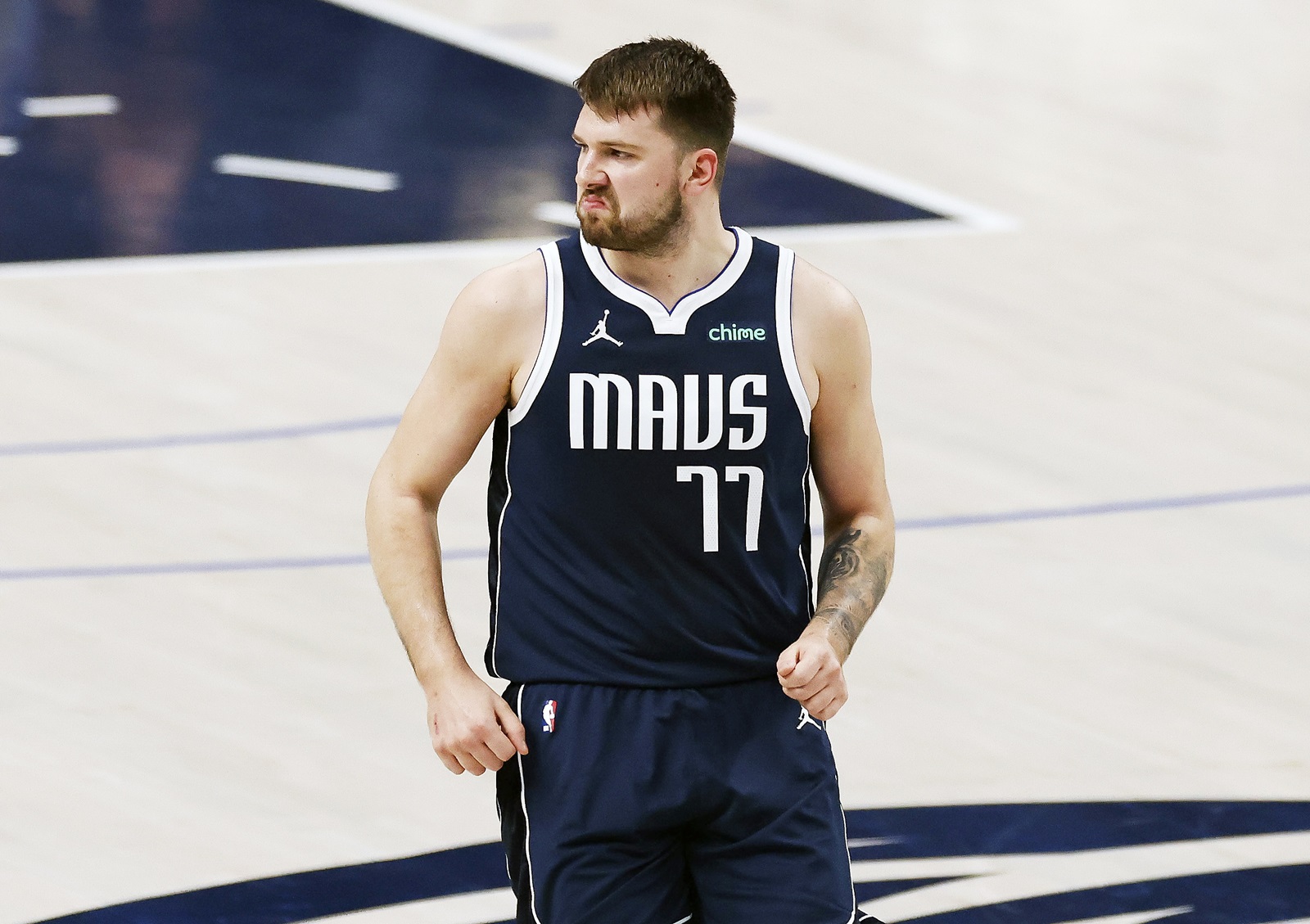 epa11376588 Dallas Mavericks guard Luka Doncic reacts after making a shot during the first half of the NBA Western Conference Finals playoff game four between the Minnesota Timberwolves and the Dallas Mavericks in Dallas, Texas, USA, 28 May 2024.  EPA/ADAM DAVIS SHUTTERSTOCK OUT