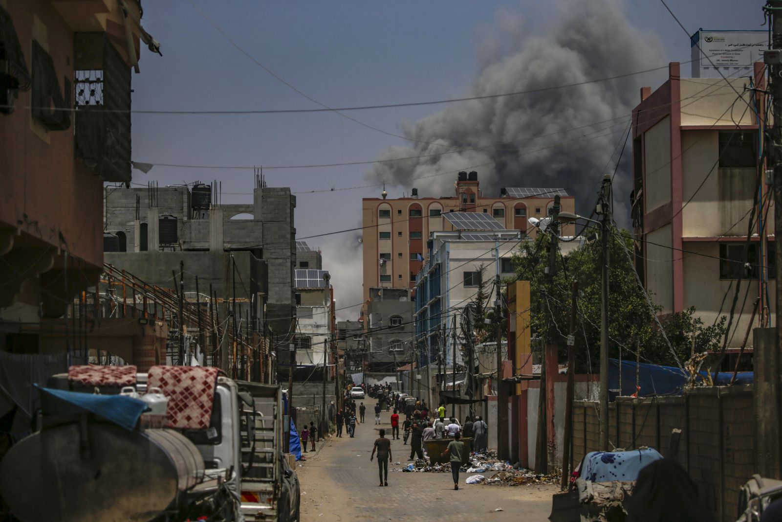 epa11397450 Smoke rises following an air strike during the Israeli military operation in Al Nusairat refugee camp in the central Gaza Strip 08 June 2024. More than 36,000 Palestinians and over 1,400 Israelis have been killed, according to the Palestinian Health Ministry and the Israel Defense Forces (IDF), since Hamas militants launched an attack against Israel from the Gaza Strip on 07 October 2023, and the Israeli operations in Gaza and the West Bank which followed it.  EPA/MOHAMMED SABER