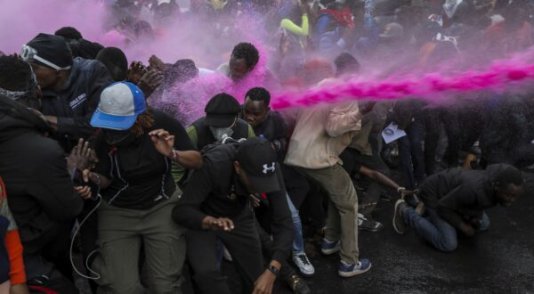 epa11426976 Protesters are pushed away by a water canon used to disperse them as they took part in a demonstration against a controversial tax bill in the central business district in Nairobi, Kenya, 20 June 2024. Police have fired tear gas to disperse protesters who gathered near the parliament to demonstrate against planned tax hikes that many fear will worsen the cost-of-living crisis.  EPA/DANIEL IRUNGU