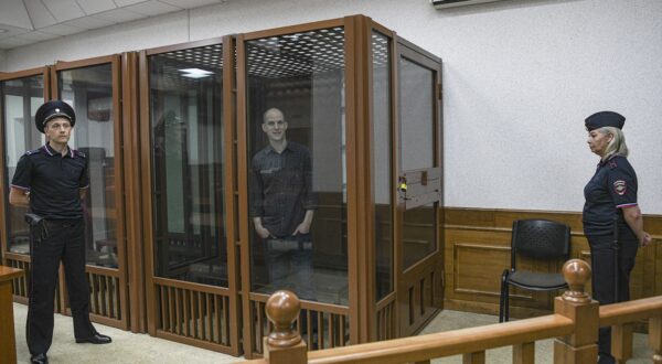 epa11438407 WSJ correspondent Evan Gershkovich stands in a glass cage prior to a hearing in Yekaterinburg's Sverdlovsk Regional Court, Yekaterinburg, Russia, 26 June 2024. Evan Gershkovich, a US journalist of The Wall Street Journal covering Russia, was detained in Yekaterinburg on 29 March 2023. The Russia's Federal Security Service (FSB) claimed that on the instructions of the American authorities, the journalist collected information constituting a state secret about one of the enterprises of the Russian military-industrial complex. He is charged with espionage under Art. 276 of the Criminal Code of the Russian Federation, which could carry a sentence of up to 20 years.  EPA/STRINGER