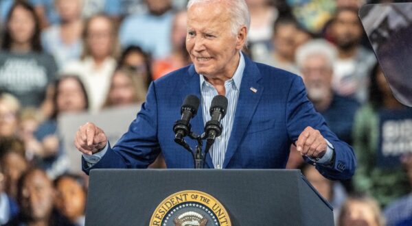 epa11443802 US President Joe Biden speaks to the crowd during a campaign event at the Jim Graham Building at the North Carolina State Fairgrounds in Raleigh, North Carolina, USA, 28 June 2024.  EPA/STAN GILLILAND