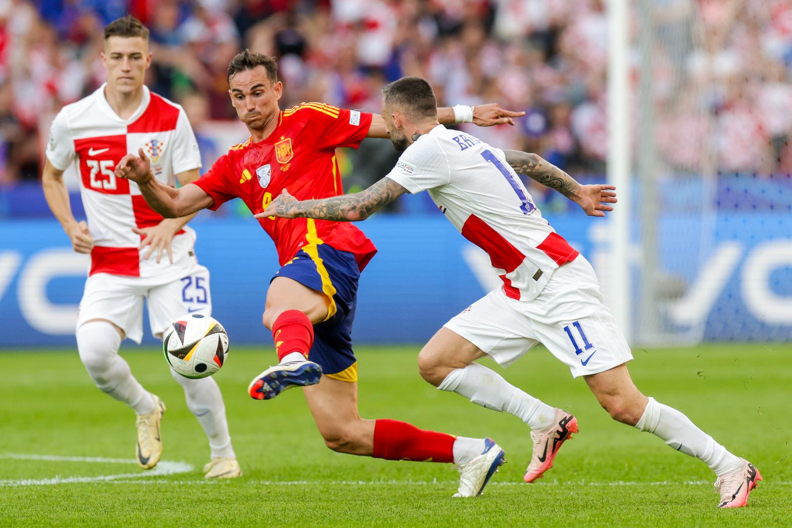 15.06.2024., Olimpijski stadion, Berlin, Njemacka - Europsko prvenstvo 2024., skupina B, 1. kolo, Spanjolska - Hrvatska. Fabian Ruiz, Marcelo Brozovic Photo: Luka Stanzl/PIXSELL