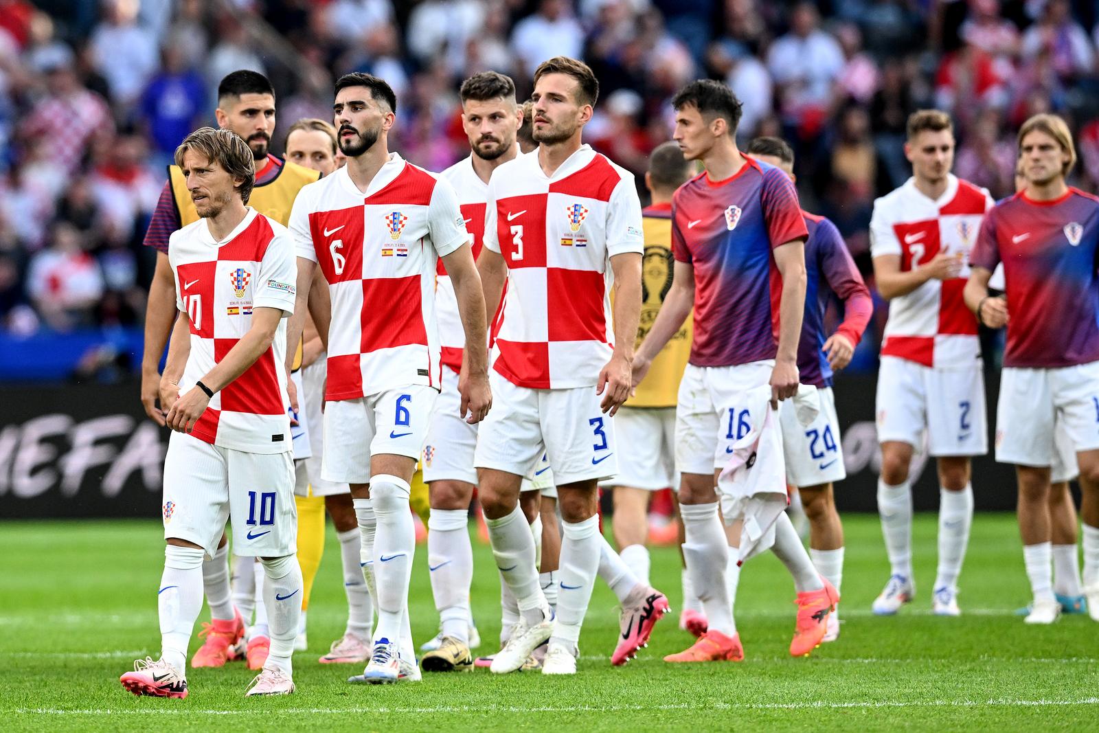 15.06.2024., Olimpijski stadion, Berlin, Njemacka - Europsko prvenstvo 2024., skupina B, 1. kolo, Spanjolska - Hrvatska. Luka Modric, Josip SUtalo, Marin Pongracic Photo: Marko Lukunic/PIXSELL