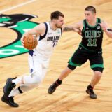Jun 9, 2024; Boston, Massachusetts, USA; Dallas Mavericks guard Luka Doncic (77) dribbles the ball against Boston Celtics guard Payton Pritchard (11) during the fourth quarter in game two of the 2024 NBA Finals at TD Garden. Mandatory Credit: Peter Casey-USA TODAY Sports Photo: Peter Casey/REUTERS