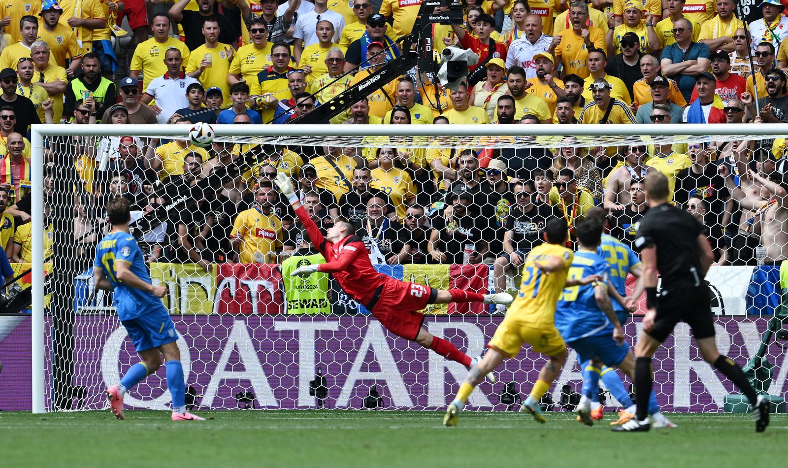 Soccer Football - Euro 2024 - Group E - Romania v Ukraine - Munich Football Arena, Munich, Germany - June 17, 2024 Romania's Nicolae Stanciu scores their first goal past Ukraine's Andriy Lunin REUTERS/Angelika Warmuth Photo: Angelika Warmuth/REUTERS