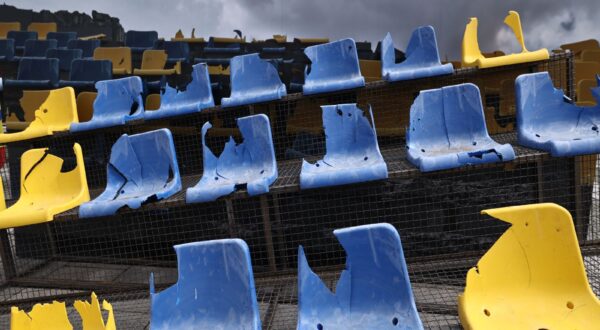 epa11417264 Damaged seats from a stadium in Kharkiv, Ukraine, exhibited  as an installation at Wittelsbacherplatz in Munich, Germany, 17 June 2024. Ukraine was a co-host for the UEFA EURO 2012 soccer tournament and the stadium was damaged during shelling amid the ongoing Russian invasion. Ukraine’s national team will face Romania in their UEFA EURO 2024 debut match in Munich, Germany, on 17 June.  EPA/ANNA SZILAGYI